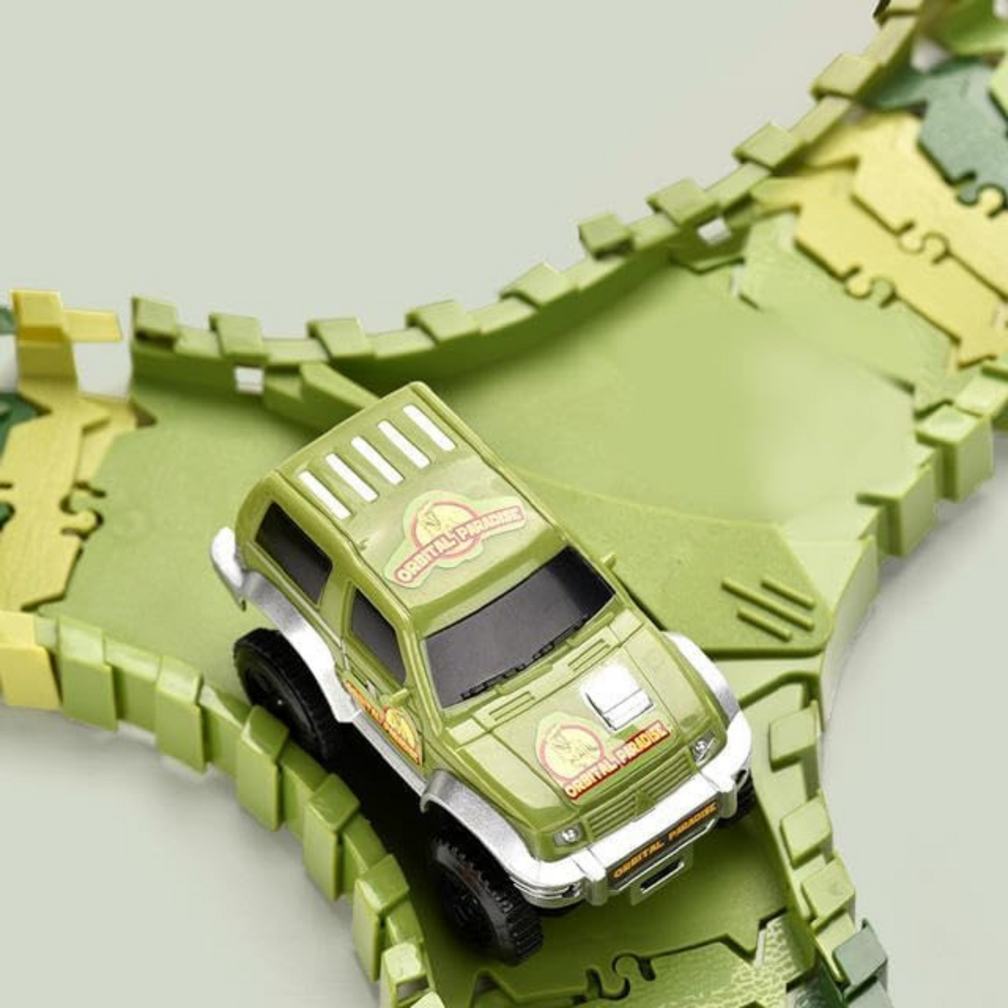 Electric Car and Dinosaur Track Toy Set - Build Your Own Car Track and Explore Dinosaur Paradise - Green Tristar