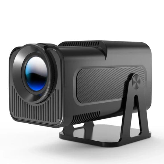 Magcubic HY320 NTV projector being used outdoors for backyard cinema setup

