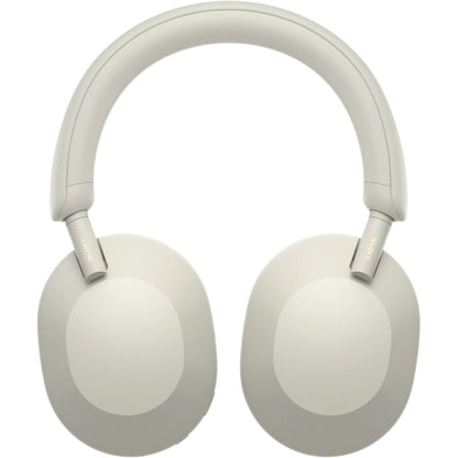 Silver WH-1000XM5 displayed angled showing earcups and touch controls