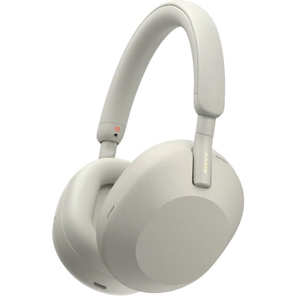 Silver Sony WH-1000XM5 headphones shown front view with earcups and headband visible