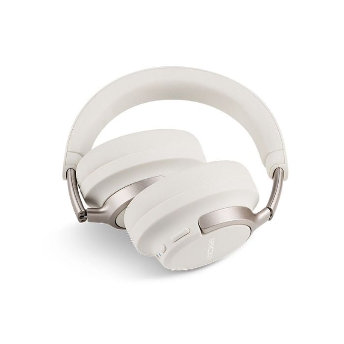 White headphones shown flat showing both earcups and adjustable headband
