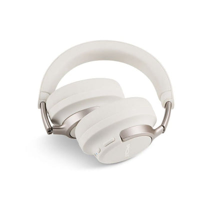 White headphones shown flat showing both earcups and adjustable headband