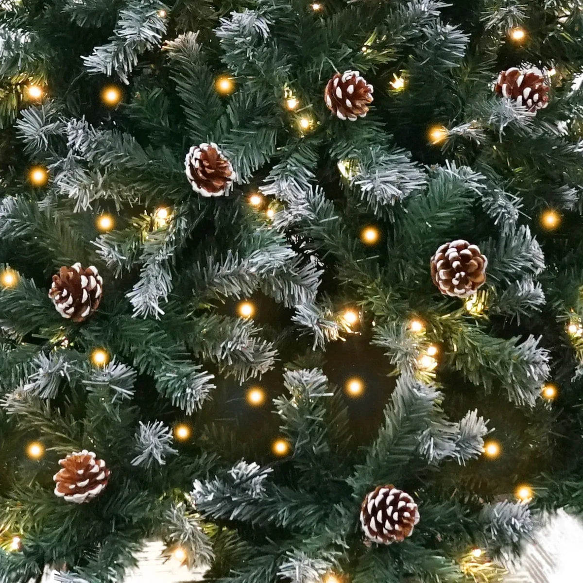 Christabelle 1.2m Pre-Lit LED Artificial Christmas Tree with Snow Tipped Needles Pine Cones Stand