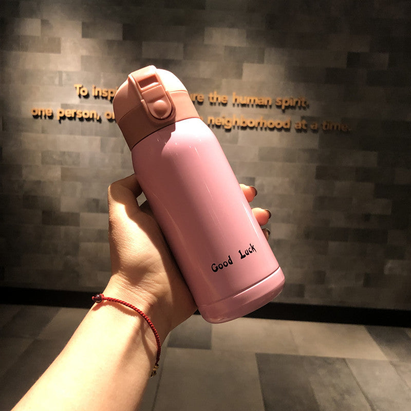 Good Luck" Mini Stainless Steel Thermos Flask - 350ml Leakproof Insulated Bottle with Pop-Up Lid & Strap(pink)" Tristar Online