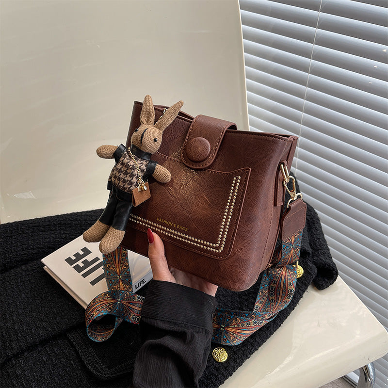 Vintage Style PU Leather Bucket Bag with Wide Patterned Strap & Optional Bunny Charm(black) Tristar Online
