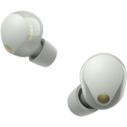 Top-view of silver WF-1000XM5 earbuds with glossy finish visible