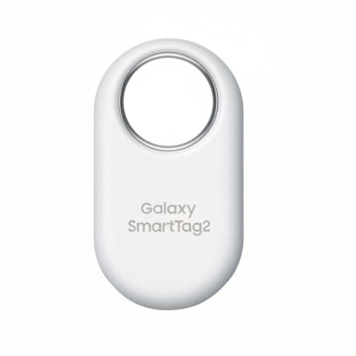 Samsung Galaxy SmartTag2 in White attached to a keyring, resting beside a Samsung Galaxy smartphone running SmartThings Find.