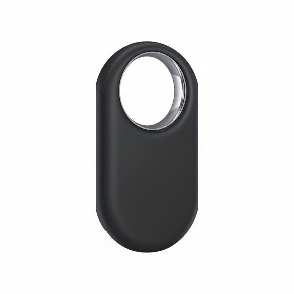 Angled shot of Samsung Galaxy SmartTag2 Black lying on a white surface, highlighting the raised SmartTag2 logo.