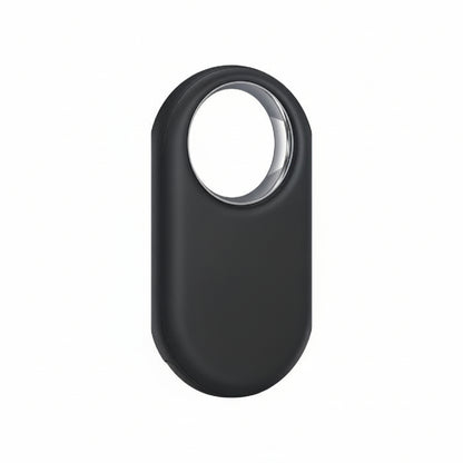 Angled shot of Samsung Galaxy SmartTag2 Black lying on a white surface, highlighting the raised SmartTag2 logo.
