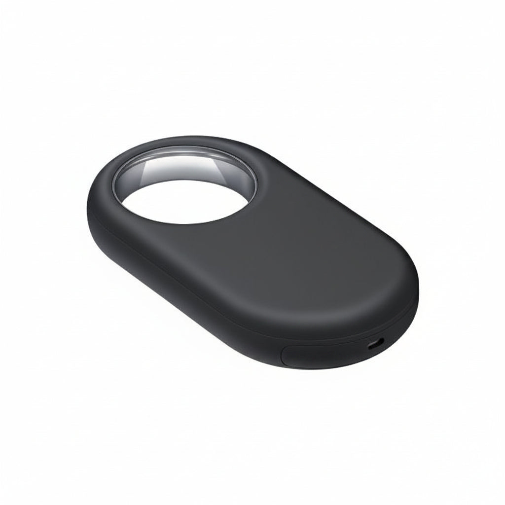 Close-up of the Samsung Galaxy SmartTag2 Black attached to a silver keyring with house keys.