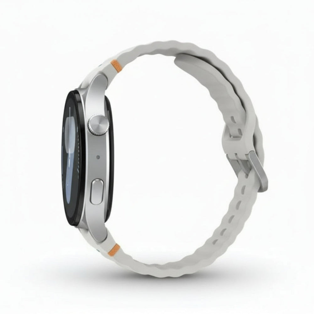 Top‑down shot of Galaxy Watch7 44mm Silver on a white surface with sport band laid flat.